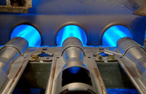 Inside a gas furnace gas burners ignited