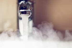 hot-water-coming-from-faucet-steaming