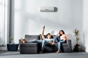 couple on sofa with mini split